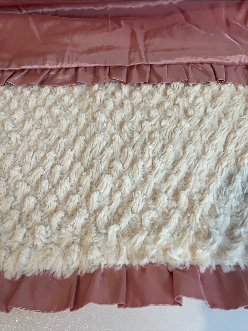 The PeanutShell Bella Blanket Ivory Diamond Plush Texture Dusty Rose Trim 32x41